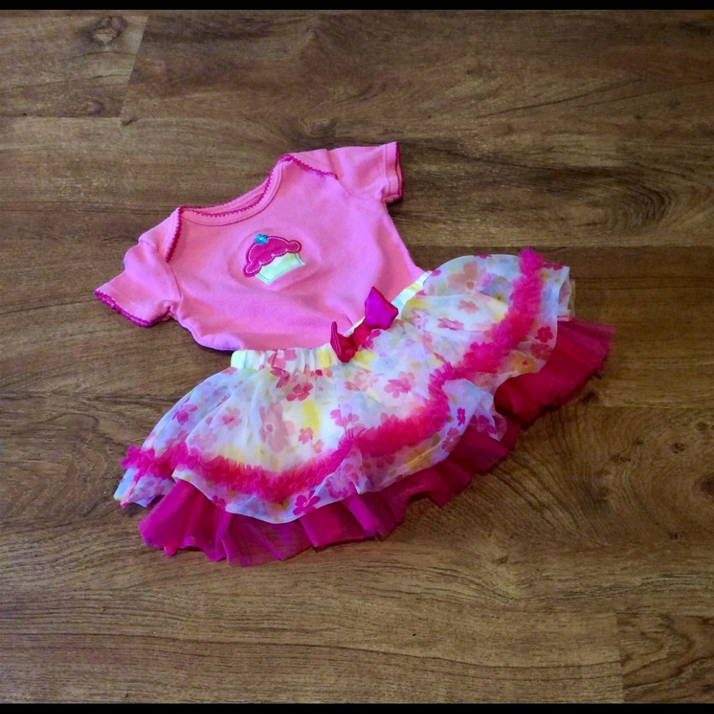 Ruffled skirt with cupcake onesie.